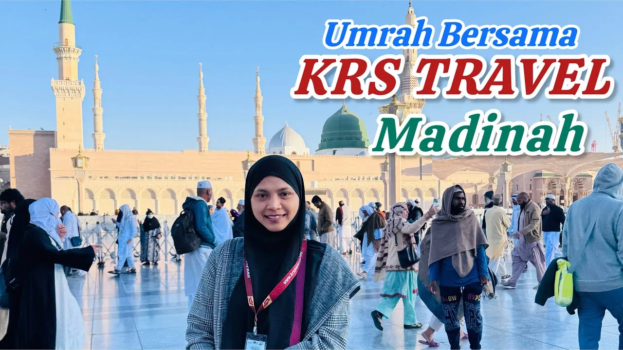Jemaah Ea Lahai Channel di dataran Masjid Nabawi, Madinah, dengan Kubah Hijau dan menara masjid di latar belakang